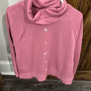 Nike NWOT, oversized sweatshirt with side pockets.